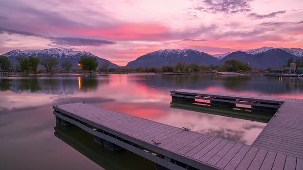 Colorful sunrise timelapse reflecting in Provo boat harbor