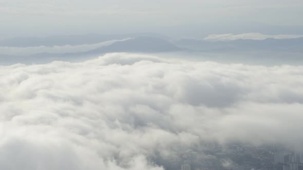 Fog sea at Penang Hill with background Georgetown cityscape