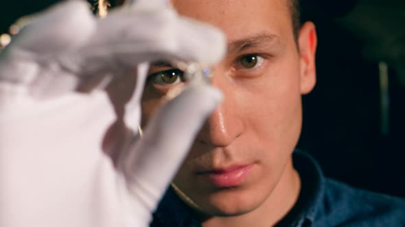 A Jeweller Checks a Big Diamond.