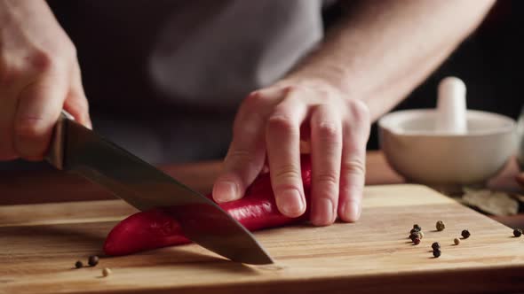 Chef Man Cutting Chili Peppers to Prepare Traditional Mexican Cuisine Food