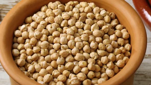 Bowl with dried chickpeas close up full frame 