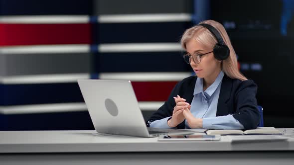 Confident Business Woman in Headphones Talking Online Video Call at Workplace Modern Hi Tech Office