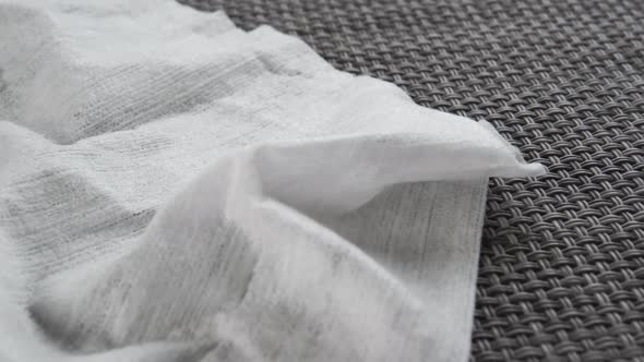 Crumpled wet wipe for disinfection against coronavirus and bacteria