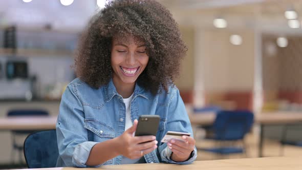 Online Shopping Via Smartphone By African Woman