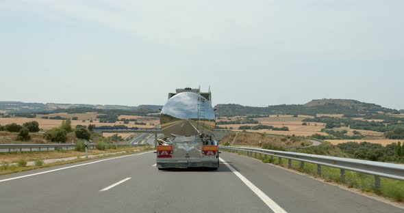 Metal Fuel Tank Truck on Empty Highway Road