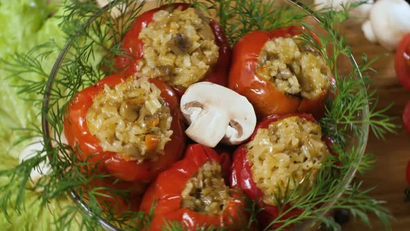 Stuffed Peppers with Mushrooms Champignons in a Glass Bowl Swirls