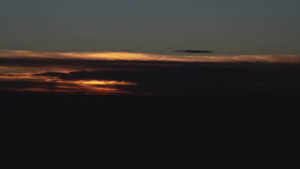 Morning Sun Emerges From Cloud and Illuminates Everything