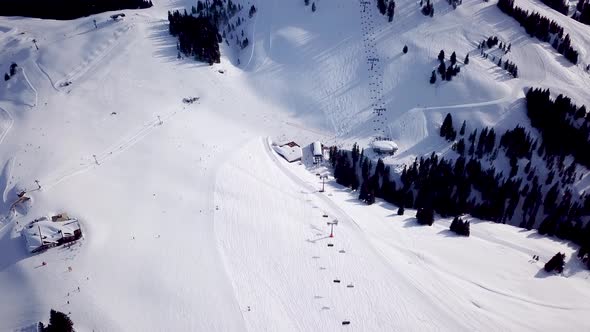 Aerial view of a ski slope in a ski resort in the Tyrolean Alps in Austria