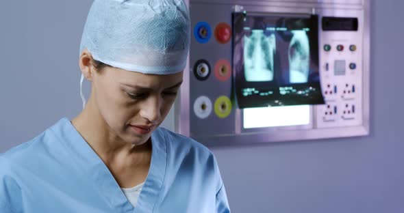 Medical professional working at a hospital alt