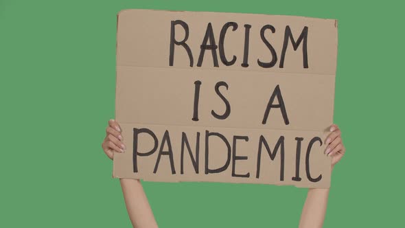 RACISM IS A PANDEMIC. Protest Text Message on Cardboard. Stop Racism. Police Violence. Banner Design