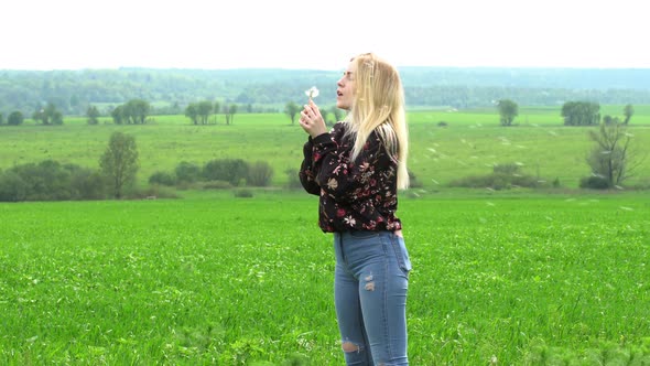 Girl and dandelion