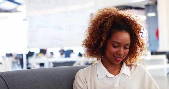 Businesswoman smiling in office