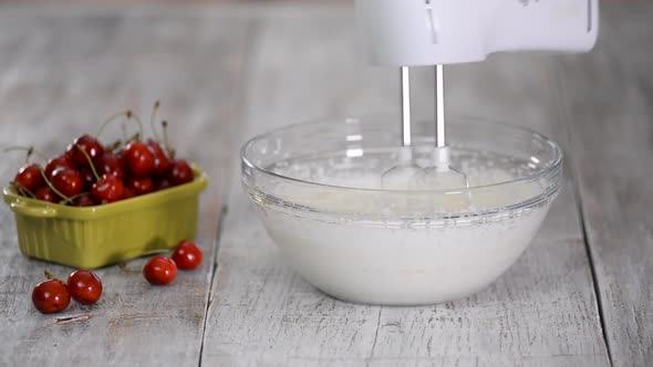 Whip The Cream With A Mixer To Make A Dessert