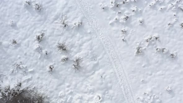 White snow over the sill 4K aerial footage