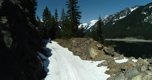 Snowmobiling Fast Speed Trail Riding Through Rocky Terrain Winter Motorsport Hardcore Extreme Sport