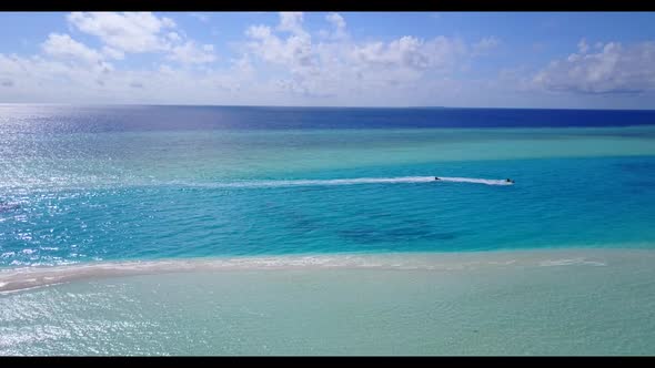 Aerial flying over abstract of paradise tourist beach adventure by blue sea and bright sandy backgro