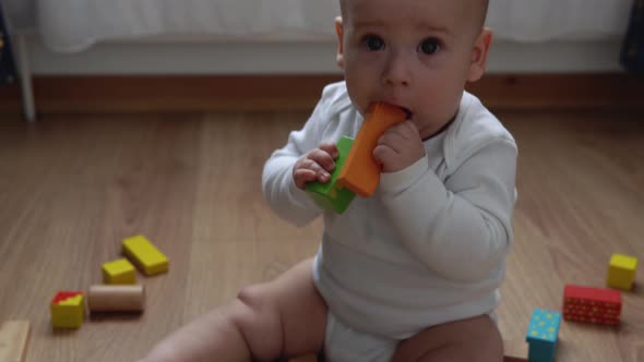 Happy Newborn Baby In Playing Room