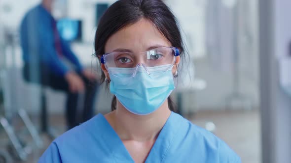 Close Up of Tired Nurse with Protection Mask