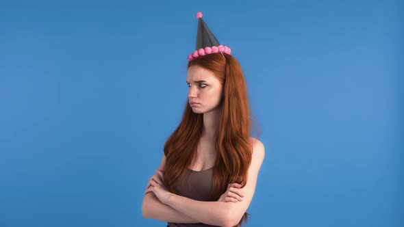 Ginger Lady in Party Hat and Khaki Shirt