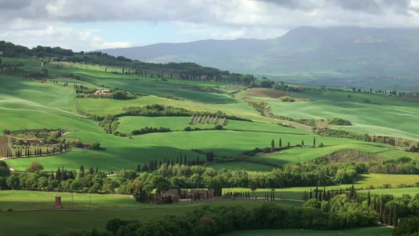 Shadows of Clouds Slide on Hills of Tuscany, Italy