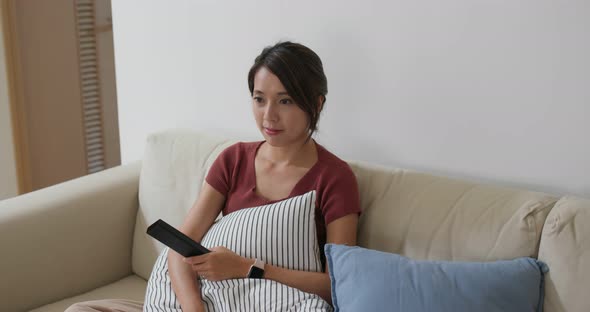 Woman watch tv at home