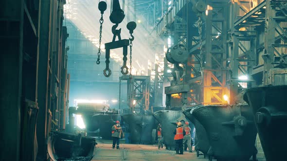 Workers are Managing Furnaces at the Metallurgical Plant