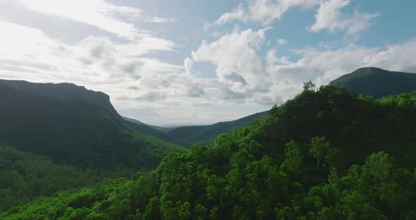 Aerial View of Beautiful Tropical Valley Between Mountains