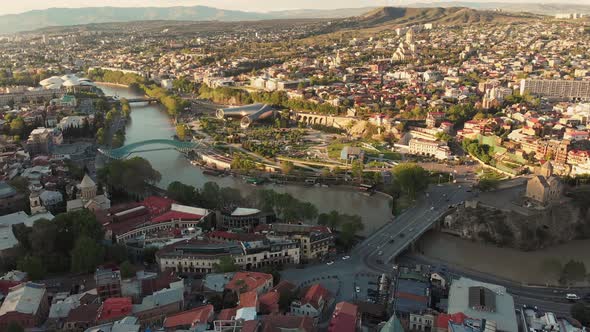 Sunny Tbilisi Panorama View. Aerial Ascending