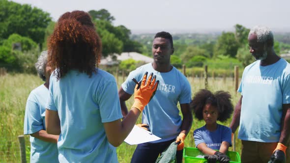 Volunteers collecting rubbish and recycling