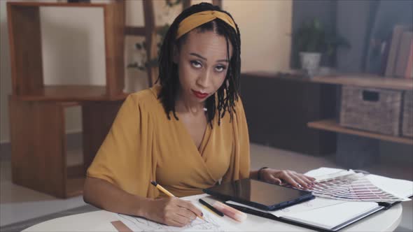 Portrait of Female Fashion Designer Working at Home