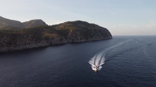 Motor Boat near Cliffs of Mallorca Island, Spain (Alcúdia)