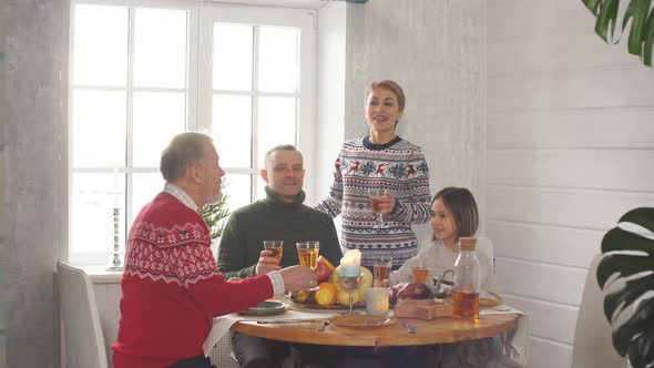 Daughter and Her Husband Are Congratulating Her Old Father with Birthday