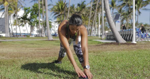 Woman Strtching on Lawn