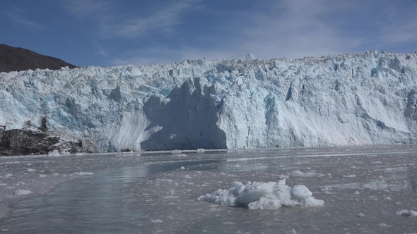 Climate change. Melting glaciers and icebergs in the ocean. Unesco World Heritage Site.