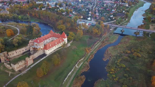 Bauska Medieval Castle Ruins Complex and Park From Above Aerial Shot 