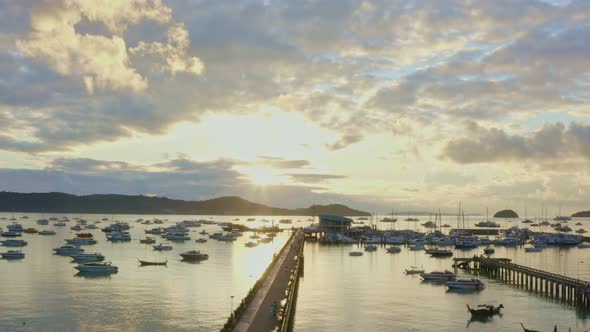 Aerial View Scenery Sun Shines Through The Sky Over Chalong Pier.