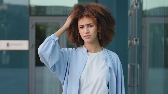 Afro American Girl Pensive Woman Student Scratches Head Thinking About Idea Remembering Memory