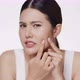 Unhappy young Asian woman squeezing her pimple, removing pimple from her face. - VideoHive Item for Sale