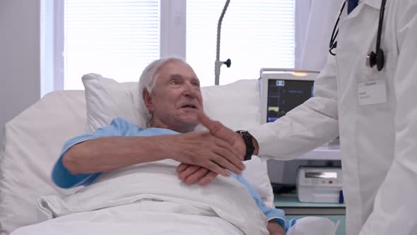 Thankful Patient Shaking Hands with Doctor