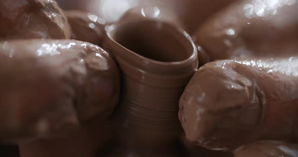 Potter Sculpts a Small Ceramic Glass in Slow Motion on a Potter's Wheel Small Forms in Pottery