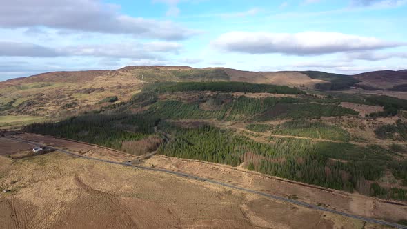 Flying Next To Forest Close To the Town Glenties in County Donegal - Ireland