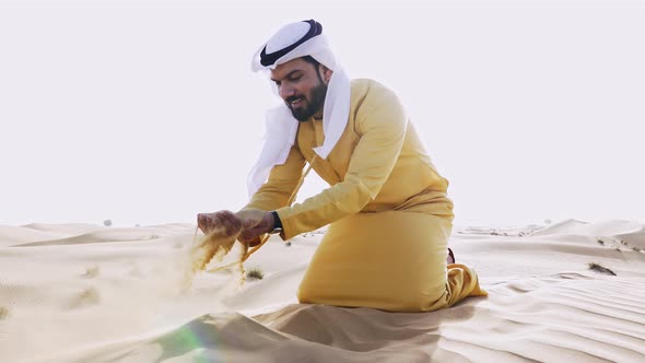 Man walking in the Dubai desert