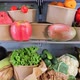 Opened refrigerator full of vegetarian healthy fruit, vegetables in zero waste boxes - VideoHive Item for Sale