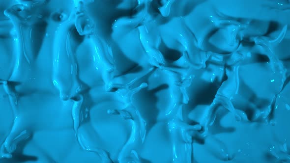 Super Slow Motion Shot of Splashing Blue Paint at 1000Fps