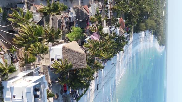 Tanzania  Aerial View of Houses Near the Coast of Zanzibar Vertical Video