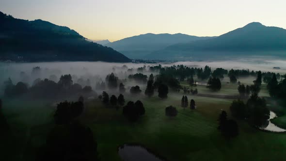 Drone Over Misty Landscape Of Zell Am See At Dawn