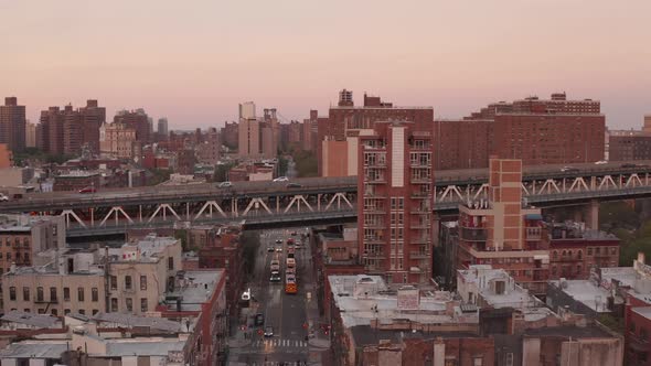 Scenic Look Over New York City Bridge at Sunset 