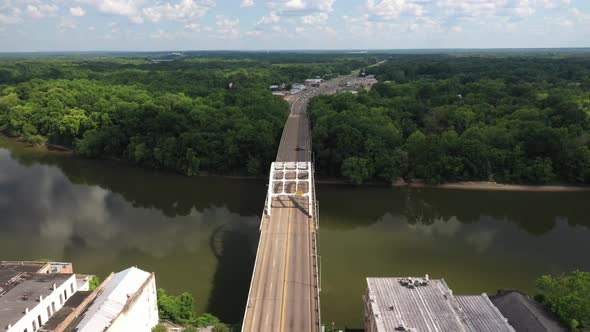 Edmund Pettus bridge in Selma, Alabama with drone video moving down with wide shot.