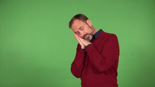 A Middleaged Handsome Caucasian Man Sleeps Wakes Up is Confused and Panics  Green Screen