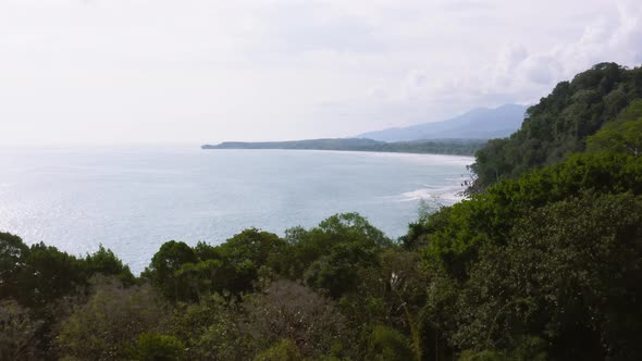 Aerial Drone View of Rainforest on the Pacific Ocean Coast in Costa Rica, Coastal Tropical Jungle La